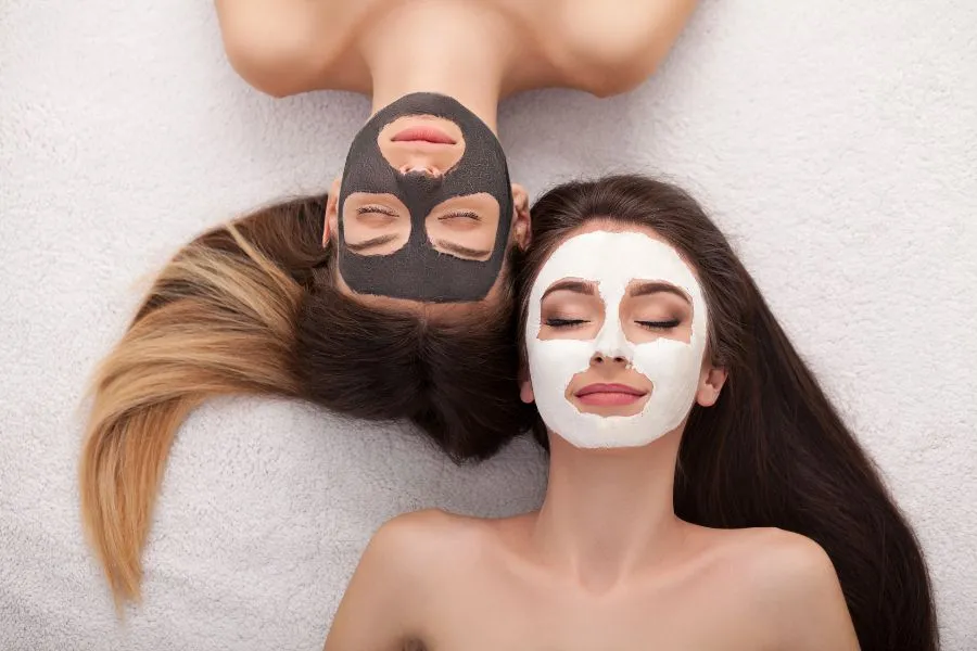 Two women with facial masks – charcoal and clay mask treatments at Celest Facial Aesthetics Jupiter FL